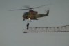 Radnik pobjegao na kraj dizalice zbog požara, spasio ga helikopter